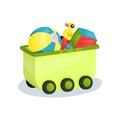 Small green wagon full of children toys. Inflatable ball, rubber duck, cube and car. Flat vector element for poster or Royalty Free Stock Photo