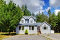 Small grey American house near the forest. Royalty Free Stock Photo