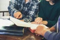 Small group of asian people praying worship believe. Teams of friends worship together before studying Holy bible. family praying Royalty Free Stock Photo