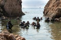 Tossa de Mar, Spain, August 2018. Tourists learn diving in a small bay.