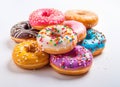 A small group of colorful donuts of different colors