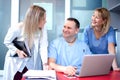 Small group of doctors working together in doctor's office. Royalty Free Stock Photo