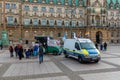 Small group of peaceful protesters by the Hamburg city hall demanding freedom for julian assange