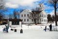 Ice skating on a frozen pond in New England Royalty Free Stock Photo