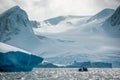 Drip, drip. Zodiac passengers watch water dripping from iceberg