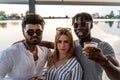 small group of young adult multiethnic friends celebrating toasting with alcohol Royalty Free Stock Photo