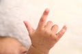 Hand with three fingers up - newborn baby boy Royalty Free Stock Photo