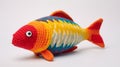 Colorful Crocheted Fish Toy On White Background