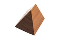 Small handmade decorative wooden pyramid on isolated white background. Royalty Free Stock Photo