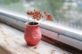Small handmade red clay with cat paws pot for making wishes or flowers from boutonnieres. Decor engobe, covered with transparent