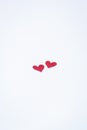 Small handmade red hearts. Isolated. Valentine`s or Wedding`s day postcard concept.