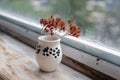 Small handmade white clay with cat paws pot for making wishes or flowers from boutonnieres. Decor engobe, covered with transparent