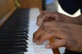 Small hands playing piano