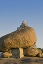 Small hanuman shrine on a boulder at sunset point at Hampi, Karnataka. Royalty Free Stock Photo