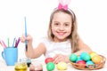 Small happy baby girl with easter eggs isolated on white Royalty Free Stock Photo