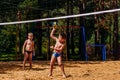 Small happy children playing beach volleyball Royalty Free Stock Photo