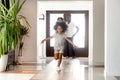 Small happy girl run in hallway moving into new house Royalty Free Stock Photo