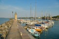 Small harbor with lighthouse on the shores of Lake Garda in Desenzano del Garda in Italy Royalty Free Stock Photo