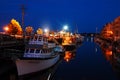 A small harbor is Portland Maine appears calm at dusk Royalty Free Stock Photo