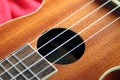 Small Hawaiian four stringed ukulele Royalty Free Stock Photo