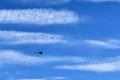 Small helicopter on big blue sky Royalty Free Stock Photo