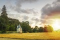 Small hidden castle during sunset on a dreamlike landscape