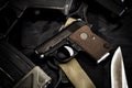 Small hidden pistol, Mini compact handgun for woman on black background.