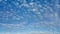 Small high altitude white clouds on sunny day, suitable for background or sky substitution