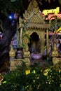 Small Hindu sanctuary on the street of an Asian city, night time