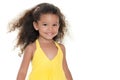 Small hispanic girl wearing a yellow summer dress Royalty Free Stock Photo