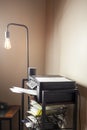 Small home office or cubical with a floor lamp Royalty Free Stock Photo