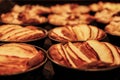 Small homemade apple pies freshly baked each in its mold Royalty Free Stock Photo