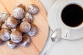 small homemade chocolate chip cookies with powdered sugar and espresso