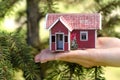 Small house in hand nature tree green Royalty Free Stock Photo