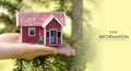 Small house in hand nature tree green pattern Royalty Free Stock Photo