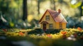 Small house model in mossy forest. Dream house concept. Royalty Free Stock Photo