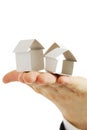 Small house from a paper in a hand Royalty Free Stock Photo