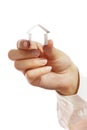 Small house from a paper in a hand Royalty Free Stock Photo