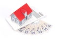 Small house on paper money Royalty Free Stock Photo