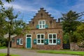 Small house with stepped gable in holland Royalty Free Stock Photo