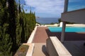 small house with a swimming pool on the shores of the Mediterran Royalty Free Stock Photo