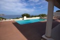 small house with a swimming pool on the shores of the Mediterran Royalty Free Stock Photo