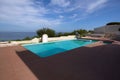 small house with a swimming pool on the shores of the Mediterran Royalty Free Stock Photo