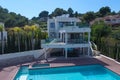 small house with a swimming pool on the shores of the Mediterran Royalty Free Stock Photo