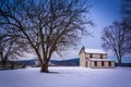 Small house and trees in a snow-covered field in Gettysburg, Pen Royalty Free Stock Photo