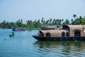 Traditional Houseboat seen sailing through the picturesque backwaters of Allapuzza or Alleppey in Kerala /India