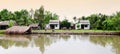 Small houses located on the river bank in Tra Vinh, Vietnam Royalty Free Stock Photo