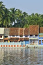 Small houses of South Indian traditional architectural near water tank at Suchindram