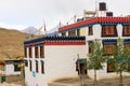 Small houses in Tibetan style high in mountains Royalty Free Stock Photo