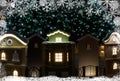 Small houses under the Christmas tree. Christmas decoration Royalty Free Stock Photo